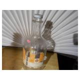 2 Brown A & W bottles, A&W Root Beer "Bulls Eye" logo on the lid.