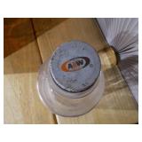 2 Brown A & W bottles, A&W Root Beer "Bulls Eye" logo on the lid.