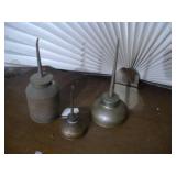 collection of vintage oil cans