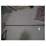 seven-tine ice fishing spear.