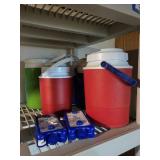 Collection of Water Coolers, Ice Packs, and Large Reusable Cold Compress