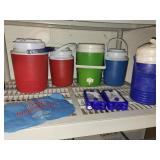 Collection of Water Coolers, Ice Packs, and Large Reusable Cold Compress