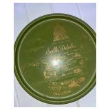 Assorted Kitchenware Lot Including Pyrex Pie Plates, Vintage South Dakota Tin, and Serving Dishes