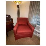 Upholstered Burgundy Armchair with Accent Pillow