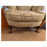 Upholstered Wingback Armchair with Floral Pattern