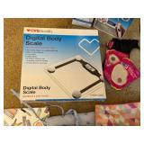 Group of Waterpik Water Flossers, CVS Digital Body Scale, Cosmetic Bags, and Accessories