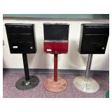 3 Pc Lot; 3 Cast Metal Candy Machines, the 2 Black Machines Have Metal Stands & The Red Has Plastic - No Keys