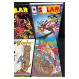 Lot of 15 Valiant Comic Books Including Solar, Harbinger, Armorines, Corps, Trencher