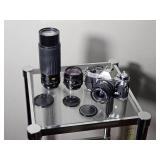 Canon AE-1 Program 35mm SLR Film Camera with 3 Lenses ? 28mm, 50mm, and 75?300mm Vivitar Zoom