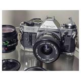 Canon AE-1 Program 35mm SLR Film Camera with 3 Lenses ? 28mm, 50mm, and 75?300mm Vivitar Zoom