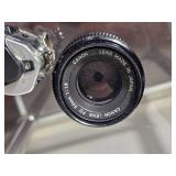 Canon AE-1 Program 35mm SLR Film Camera with 3 Lenses ? 28mm, 50mm, and 75?300mm Vivitar Zoom