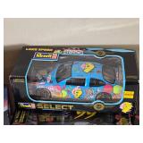 NASCAR Die Cast Model Cars - 1:24 - Action / Racing Champions / Revell - The Joker Ford Taurus #28 Kenny Irwin (1998) / Bruce Lee Ford Taurus #99 Jeff Burton (1998) / Cartoon Network Ford Taurus #9 La
