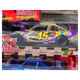 NASCAR Die Cast Model Cars Ð 1:24 Ð Racing Champions / Revell Ð Family Channel #16 Musgrove (1994), Small Soldiers #44 Stewart (1998), Spree #45 Petty (1999), Maxwell House #22 Labonte (1991), DeWa