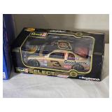 NASCAR Die Cast Model Cars - 1:24 - Racing Champions / Action / Sports Image - Quality Care Ford Taurus #88 Dale Jarrett / Bass Pro Shops Chevrolet Monte Carlo #3 Dale Earnhardt / Atlanta Olympics Che
