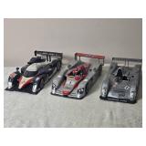 Die Cast Model Cars - 1:18 - Hot Wheels - Cadillac Northstar LMP GMTM (2000) / Infineon Audi R8 Le Mans (2002) / Peugeot 908 Hdi FAP /