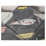 IndyCar Die Cast Model Cars - 1:18 - Lola Menard #60 Scott Brayton (1995) / #40 Arie Luyendyk (1995) / #20 Tony Stewart (1996) / Newman-Haas Lola #6 Mario Andretti (1993)