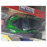 1:18 Die-Cast Corvette Duo – 2009 Corvette ZR1 (Jada Bigtime Muscle) & 2016 Corvette Stingray “Crosshairs” Transformers Metals Die-Cast – Boxed Pair