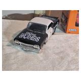Die-Cast TV & Movie Classics Lot – ERTL Dukes of Hazzard “General Lee” 1:25 NIB + Blues Brothers “Bluesmobile” 1:25