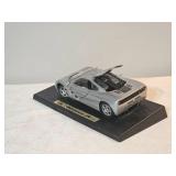 Maisto McLaren F1 (1993) Die-Cast Model on Display Base – Silver Supercar – Gullwing Doors & Detailed Engine