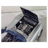 1:18 Corvette Diecast Pair – Exoto Corvette Grand Sport #10 & GMP Goodwrench C5-R #4 (Group of 2)