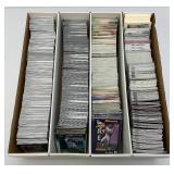 Large Box Of Misc. Unsorted Sports Cards Some With Protective Sleeves