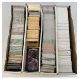 Large Box Of Misc. Unsorted Sports Cards Some With Protective Sleeves