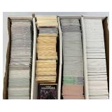 Large Box Of Misc. Unsorted Sports Cards Some With Protective Sleeves