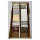 Large Box Of Misc. Unsorted Sports Cards Some With Protective Sleeves