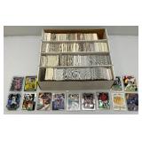 Large Box Of Misc. Unsorted Sports Cards Some With Protective Sleeves