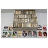 Large Box Of Misc. Unsorted Sports Cards Some With Protective Sleeves