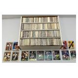 Large Box Of Misc. Unsorted Sports Cards Some With Protective Sleeves