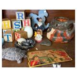 Vintage Collectibles Lot with Care Bear Mug, Wooden Blocks, Pottery, Figurines, and Ephemera