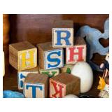 Vintage Collectibles Lot with Care Bear Mug, Wooden Blocks, Pottery, Figurines, and Ephemera