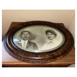 Antique Oval Bubble Glass Portrait with Tiger Stripe Wood Frame, 23x17 Inches