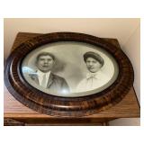 Antique Oval Bubble Glass Portrait with Tiger Stripe Wood Frame, 23x17 Inches
