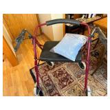 Adult Mobility Walker with Seat and Bag of Blue Terry Cloth Adult Bibs