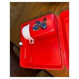 Vintage GoBots Lunchbox with Thermos, Red Skateboard, and Toy Vehicle Collection