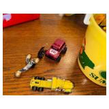 Vintage GoBots Lunchbox with Thermos, Red Skateboard, and Toy Vehicle Collection