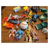 Collection of 1980s Action Figures, Robots, and Toy Vehicles