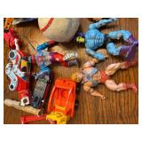 Collection of 1980s Action Figures, Robots, and Toy Vehicles