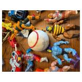Collection of 1980s Action Figures, Robots, and Toy Vehicles