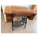 Vintage Treadle Sewing Machine in Ornate Wood Cabinet with Drawers