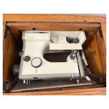 Vintage Treadle Sewing Machine in Ornate Wood Cabinet with Drawers