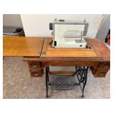 Vintage Treadle Sewing Machine in Ornate Wood Cabinet with Drawers