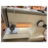 Vintage Treadle Sewing Machine in Ornate Wood Cabinet with Drawers