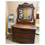 Antique Wooden Dresser with Ornate Mirror and Four Drawers