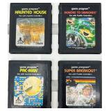 Collection of Atari 2600 Cartridges in Binder and 2 PSP Racing Games