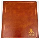 Collection of Atari 2600 Cartridges in Binder and 2 PSP Racing Games