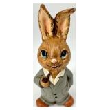 Collection of 13 Vintage Figurines and Dolls Including Goofy, Matryoshka, and Character Pieces