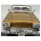 2 Diecast Model Cars Including 1958 Pontiac Bonneville and Convertible